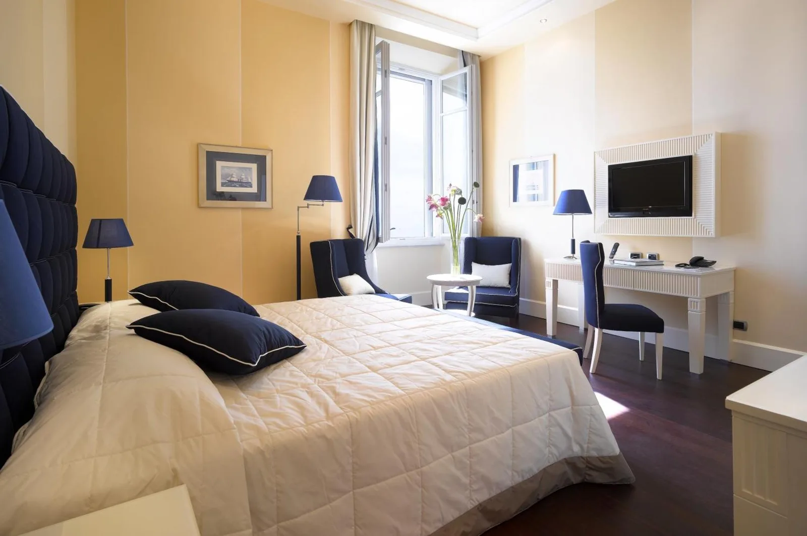 Acogedor dormitorio en GH Palazzo Suite & SPA