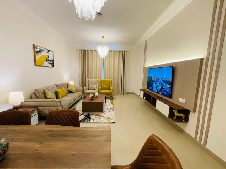 Modern living room setup at Goodwood Suites Homes Vacation in Dubai