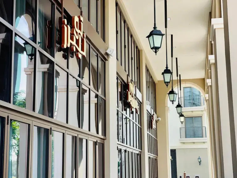 Shopping area façade at Goodwood Suites Homes Vacation in Dubai