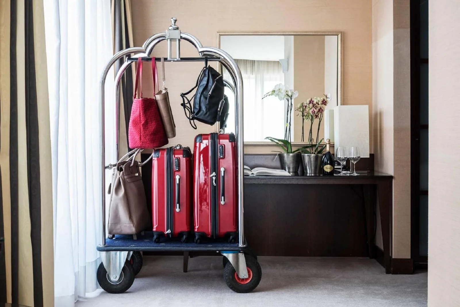 Luggage cart with bags and suitcases at Grand Hotel De La Ville, Parma