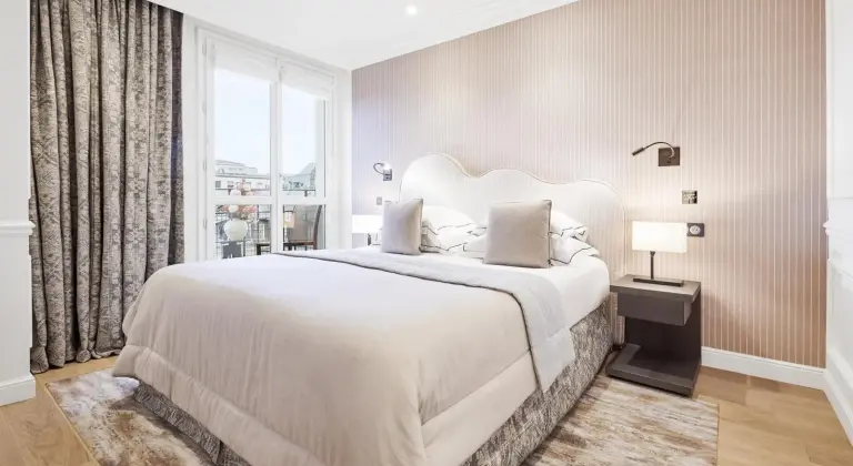 Elegant bedroom at Grand Hôtel Du Palais Royal in Paris