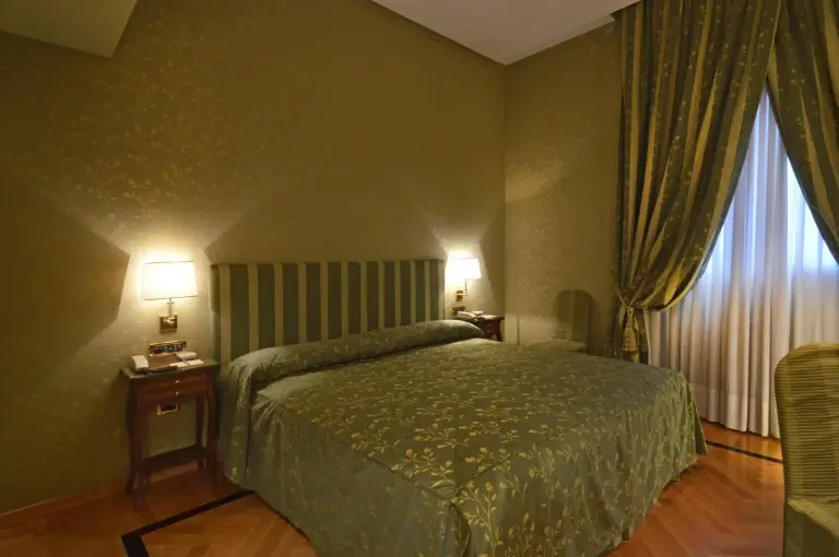 Cozy room at Grand Hotel Vesuvio in Naples