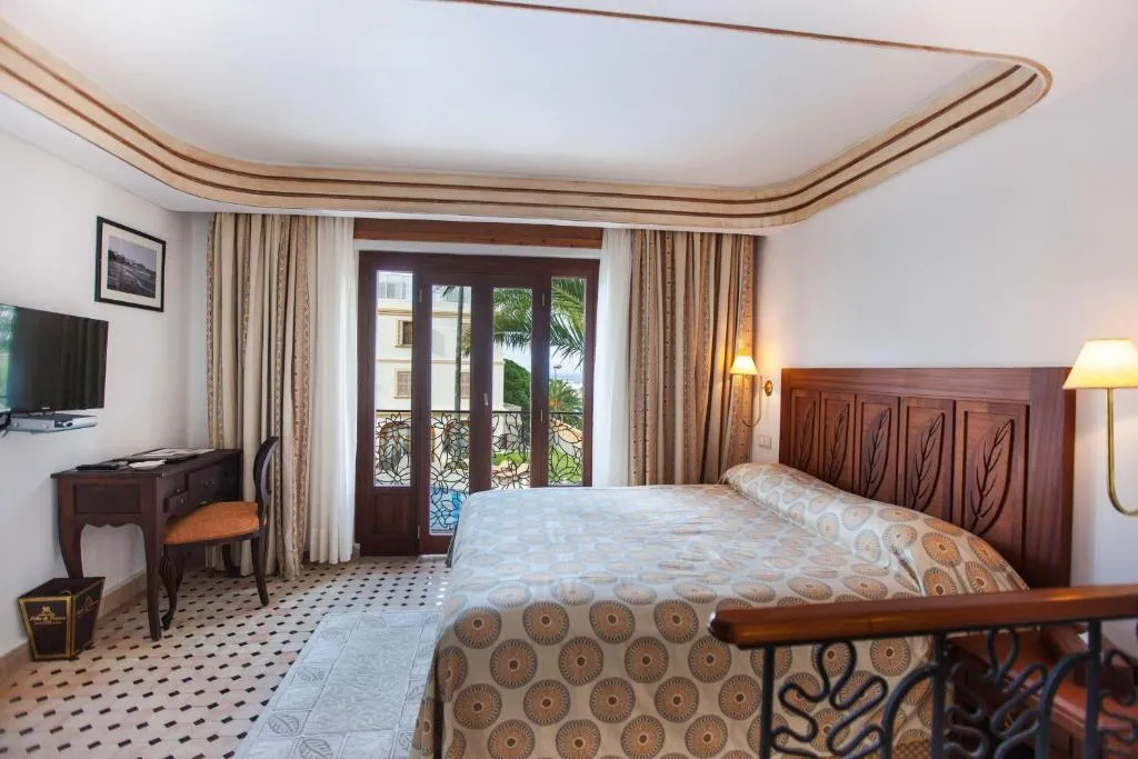 Guest room with balcony in Grand Hotel Villa de France, Tangier