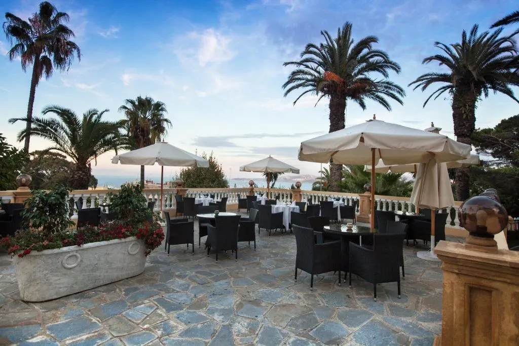 Terrace dining setup at Grand Hotel Villa de France, Tangier