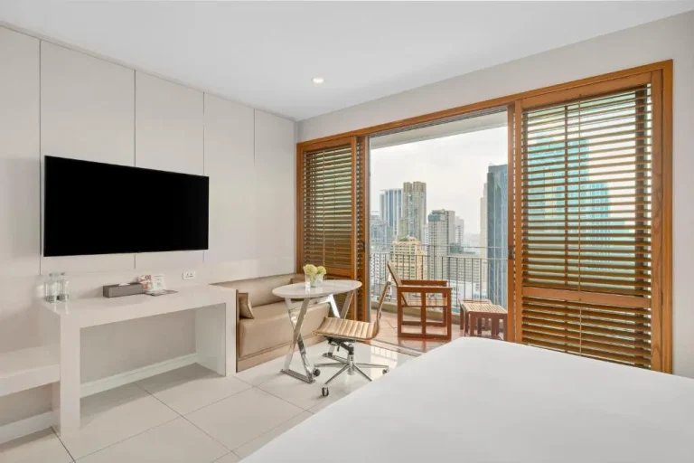 Grande Centre Point Ploenchit room with a city view