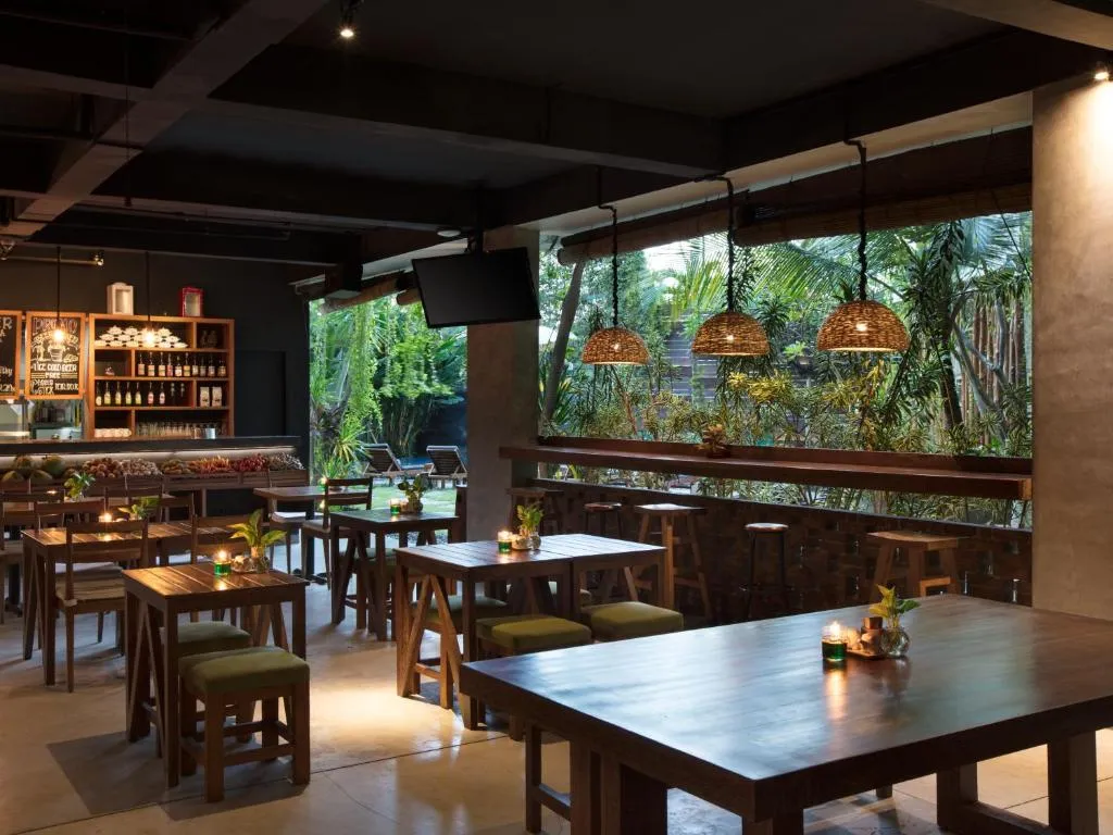 Dining area at Grandmas Plus Hotel Airport Bali