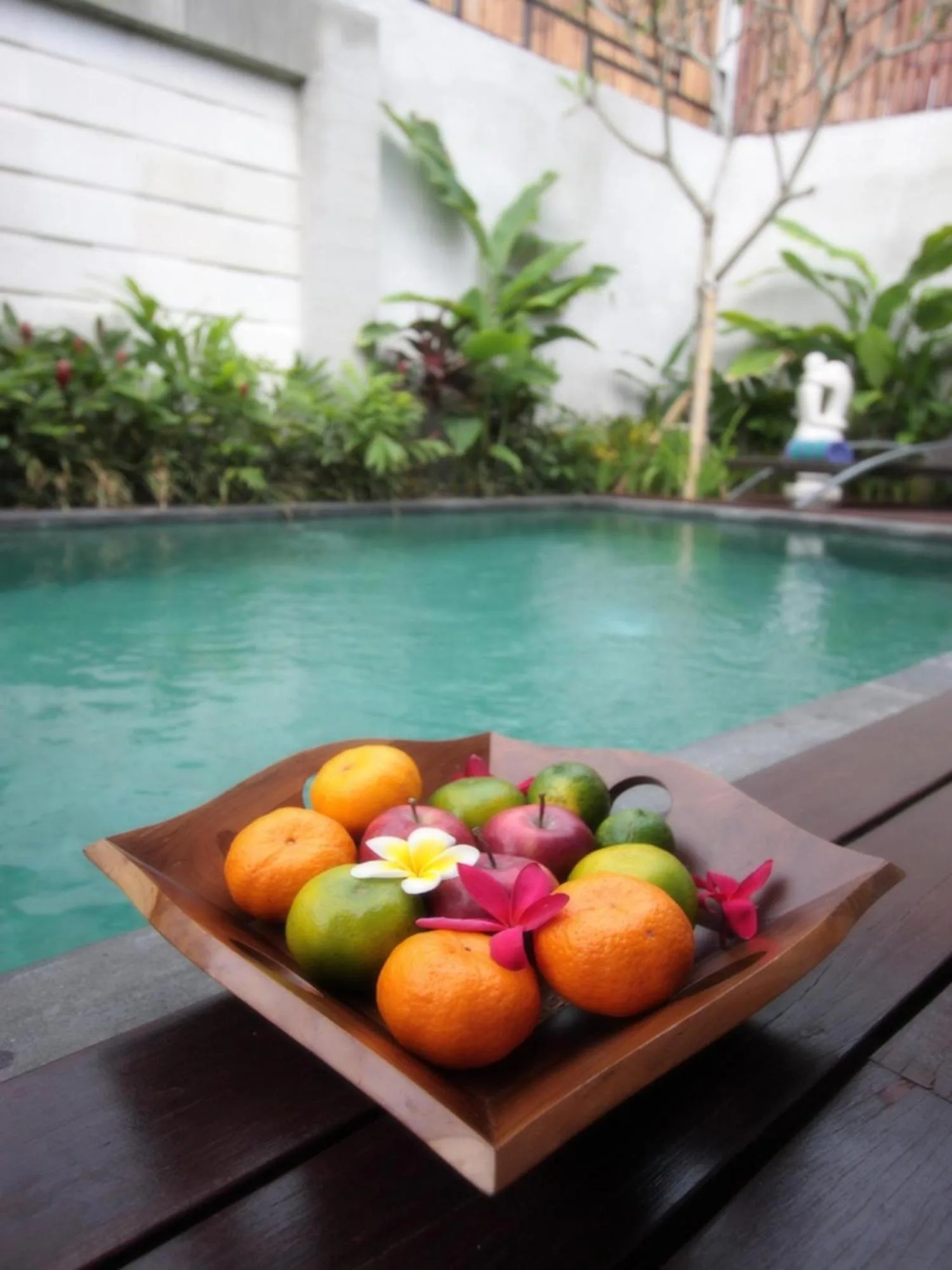 Fresh tropical fruit served by the pool at Grania Bali Villas in Seminyak, Bali.