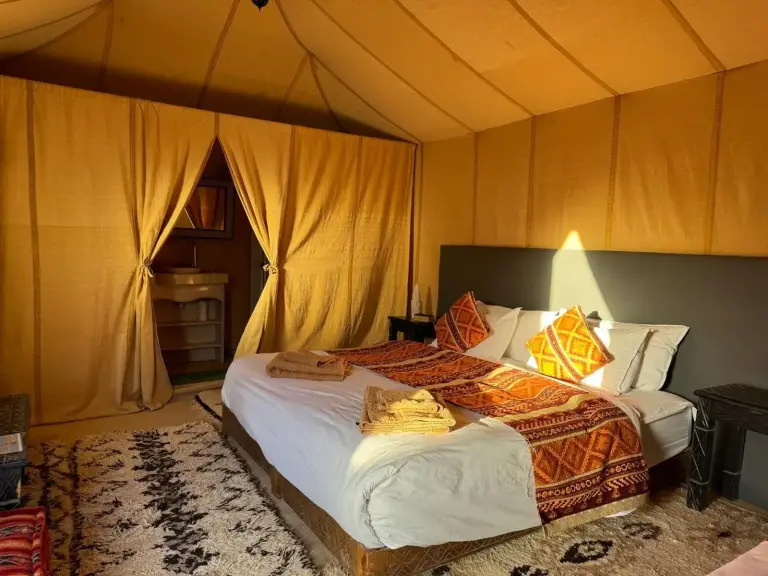 Cozy setup of a tent at Hagra Luxury Camp Merzouga