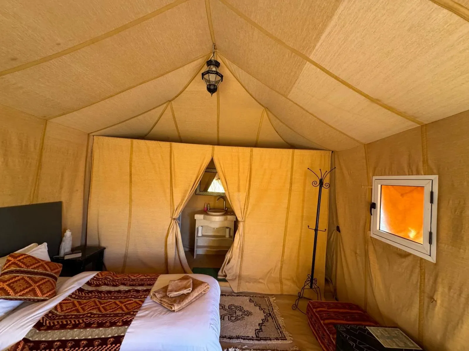 Interior view of a tent at Hagra Luxury Camp Merzouga