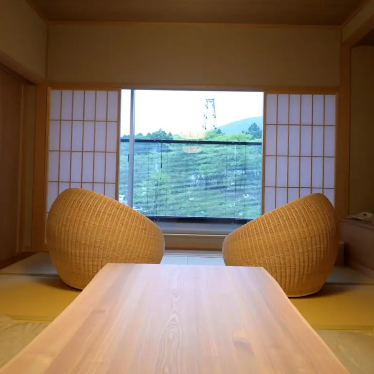 Cozy seating area in a room at Hakone Gora Byakudan