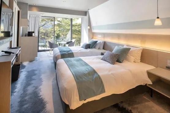Chambre invitante au HAKONE NICA avec design moderne