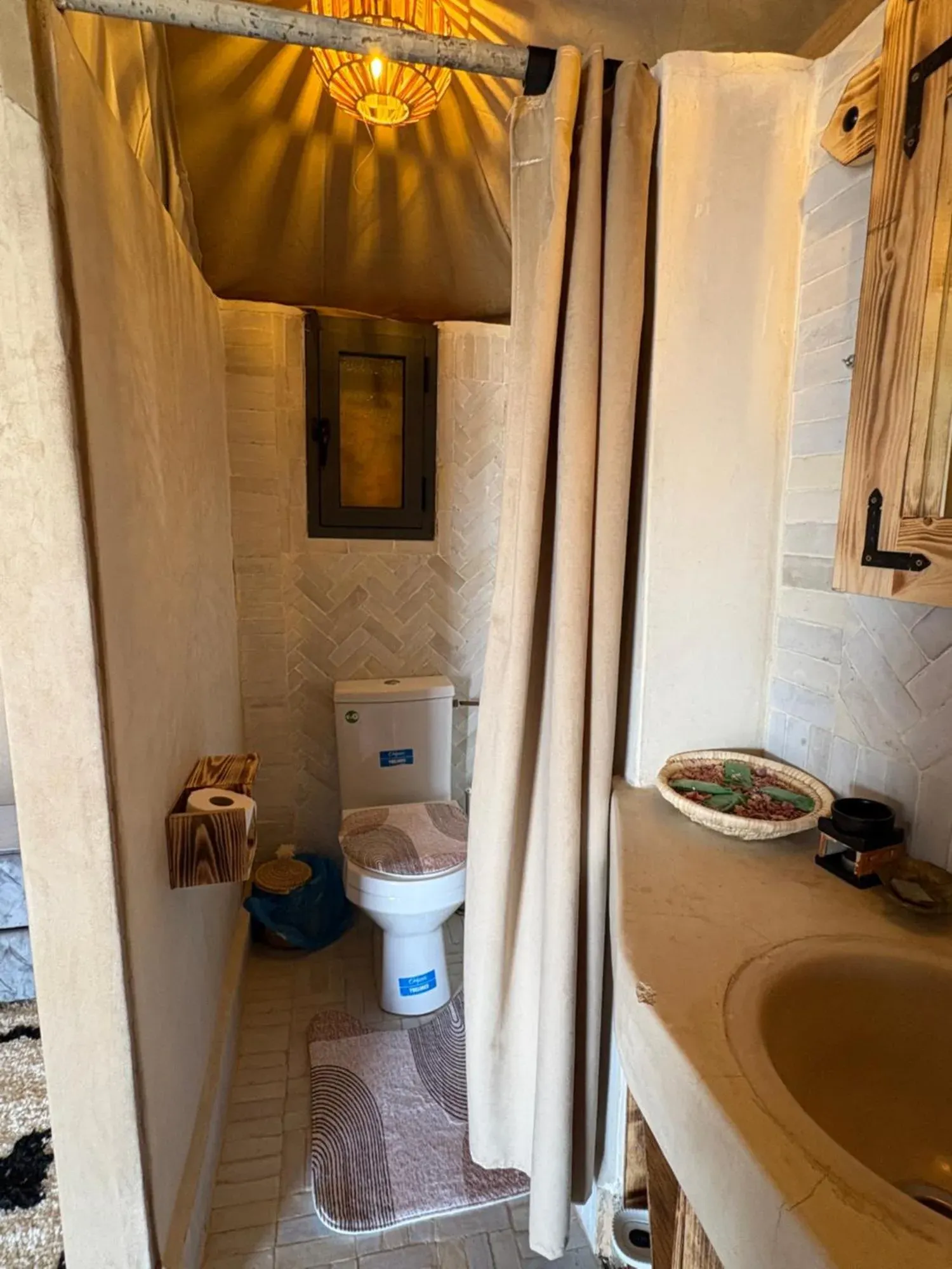 Bathroom area at Harmony Luxury Camp in Merzouga with modern amenities