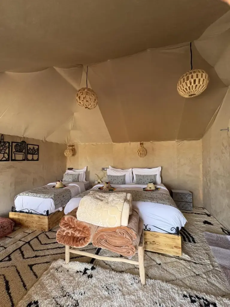 Chic interior design of a tent at Harmony Luxury Camp in Merzouga