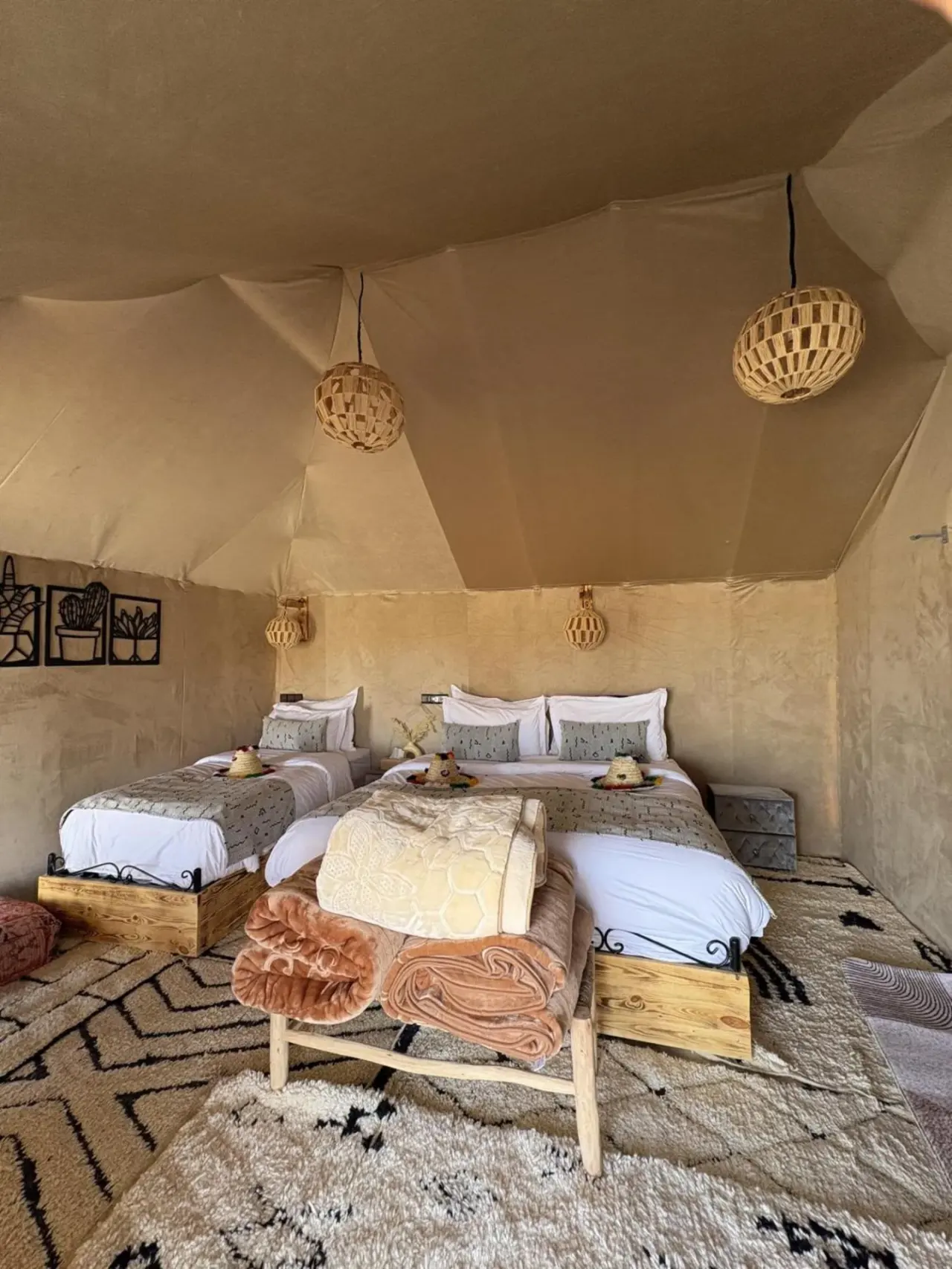 Chic interior design of a tent at Harmony Luxury Camp in Merzouga