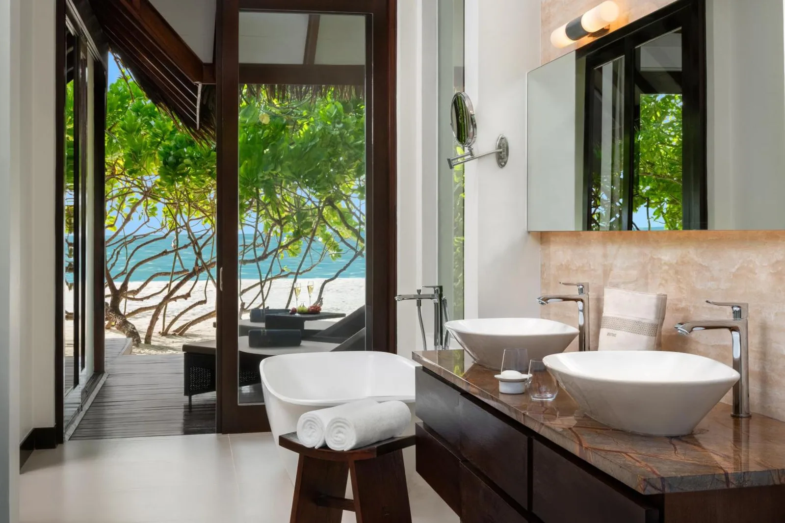 Heritance Aarah - Premium All Inclusive - 40 Minutes away from Male by Seaplane – Raa Atoll, Maldives hotel – a villa with a living room with a couch at Heritance Aarah - Premium All Inclusive - 40 Minutes away from Male by Seaplane in Raa Atoll