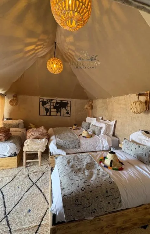 Cozy area in a tent at Hideaway Luxury Camp