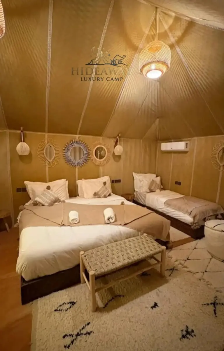 Interior of a family tent at Hideaway Luxury Camp