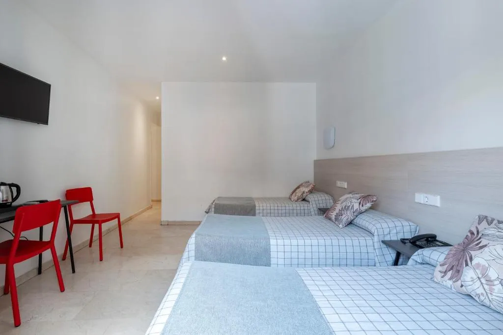 Triple Room at Hostal Castilla II Puerta del Sol in Madrid