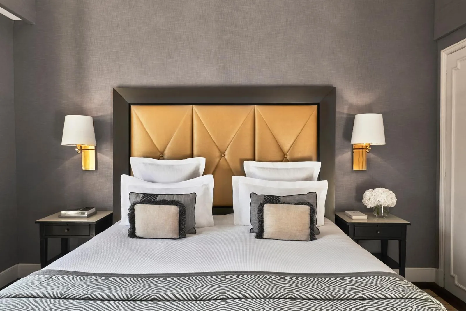Bed and decor at Hôtel Barrière Le Majestic Cannes