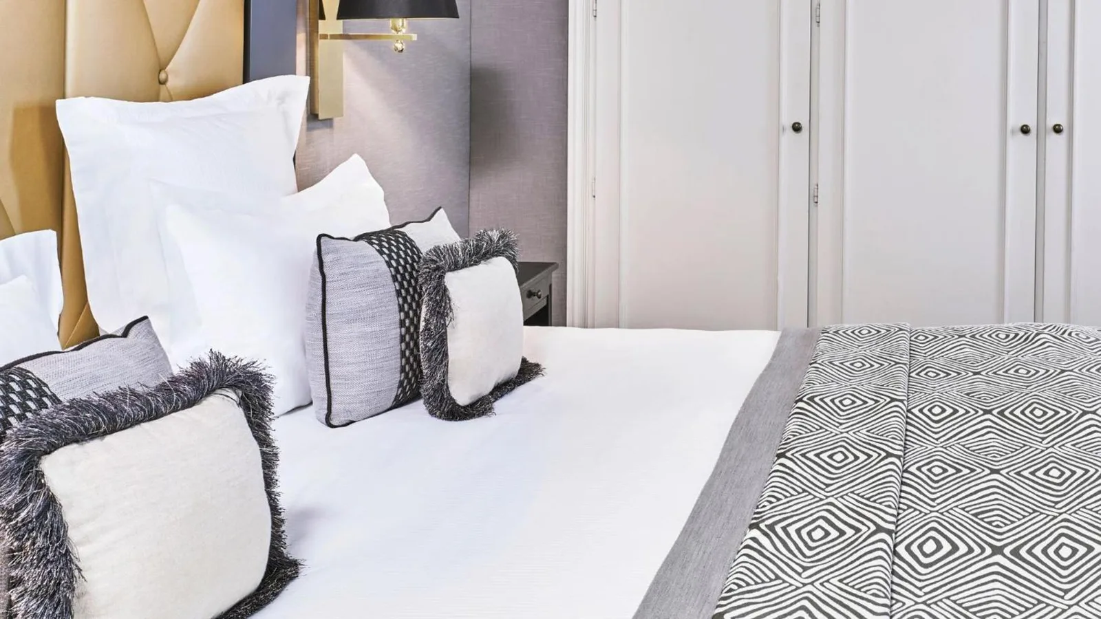 Close-up of bed at Hôtel Barrière Le Majestic Cannes