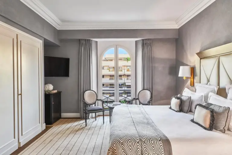 Stylish bedroom at Hôtel Barrière Le Majestic Cannes