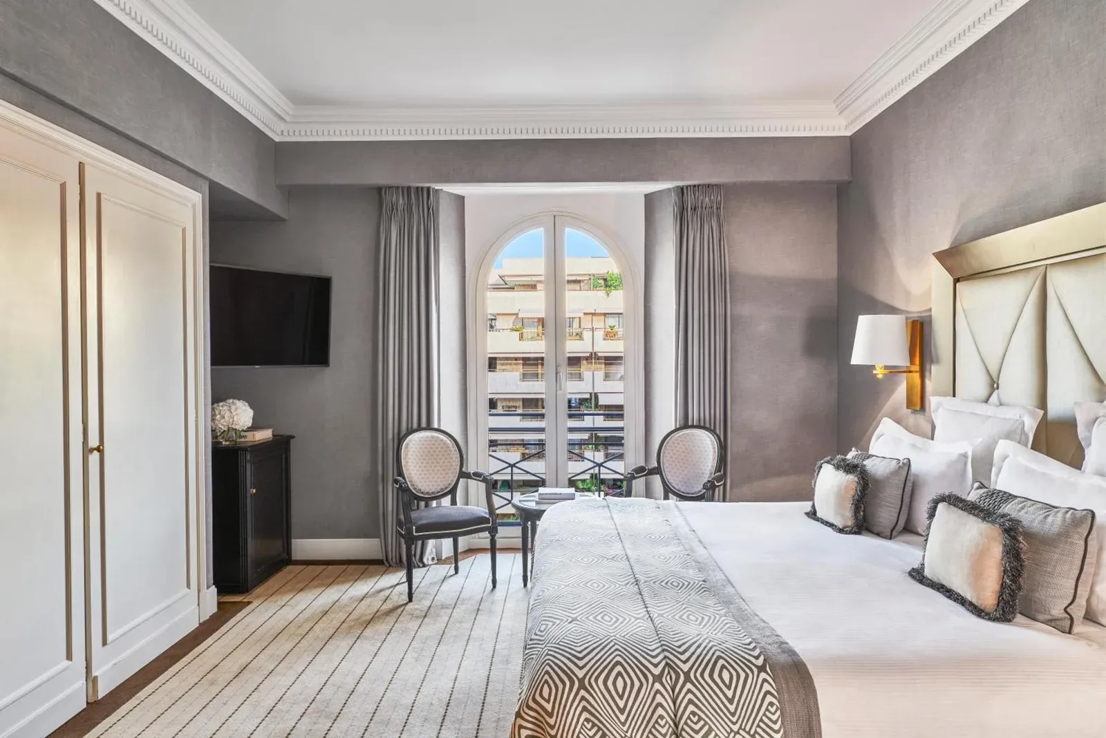 Stylish bedroom at Hôtel Barrière Le Majestic Cannes