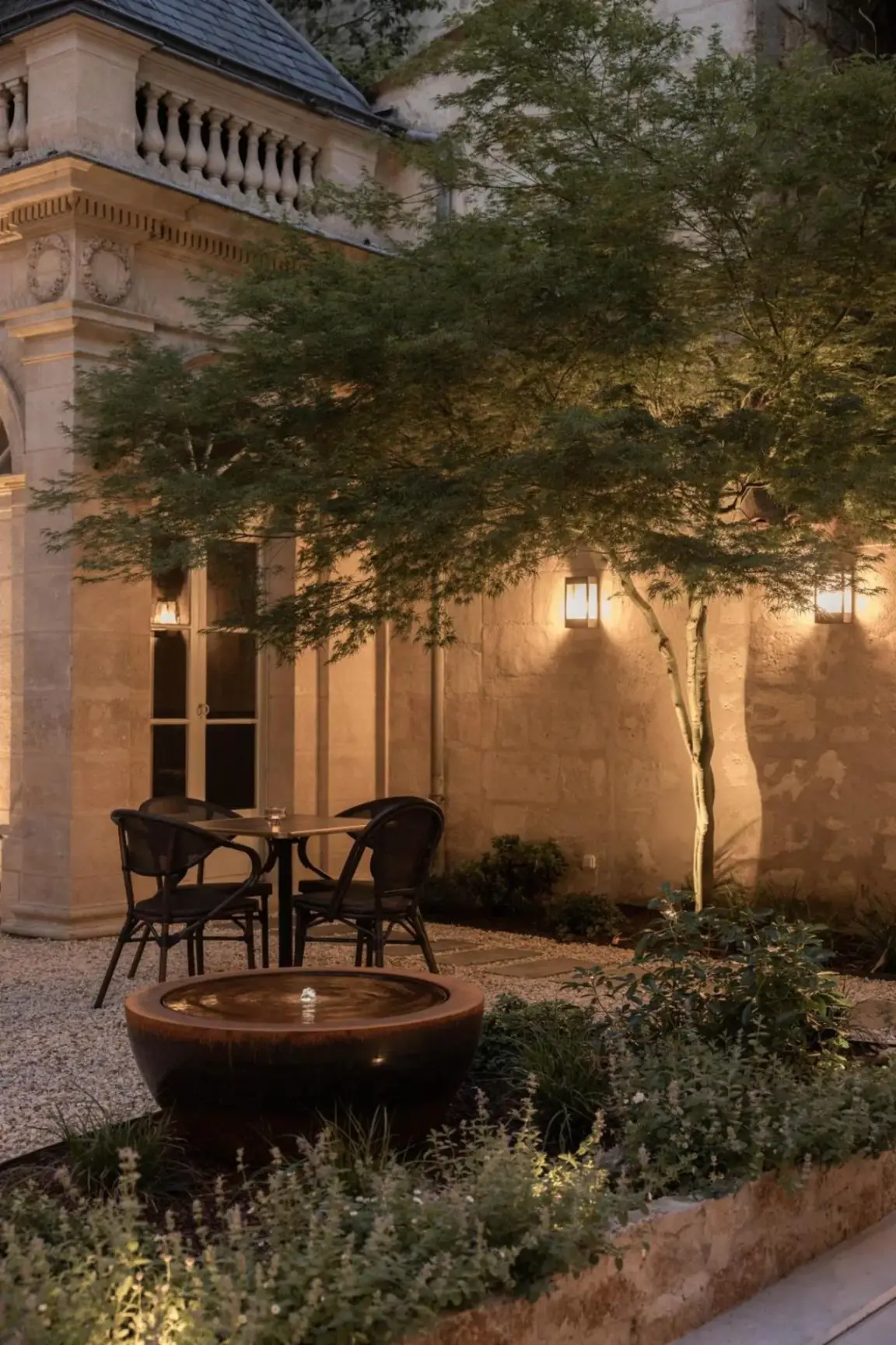 Outdoor seating area at Hotel des Quinconces Bordeaux Centre