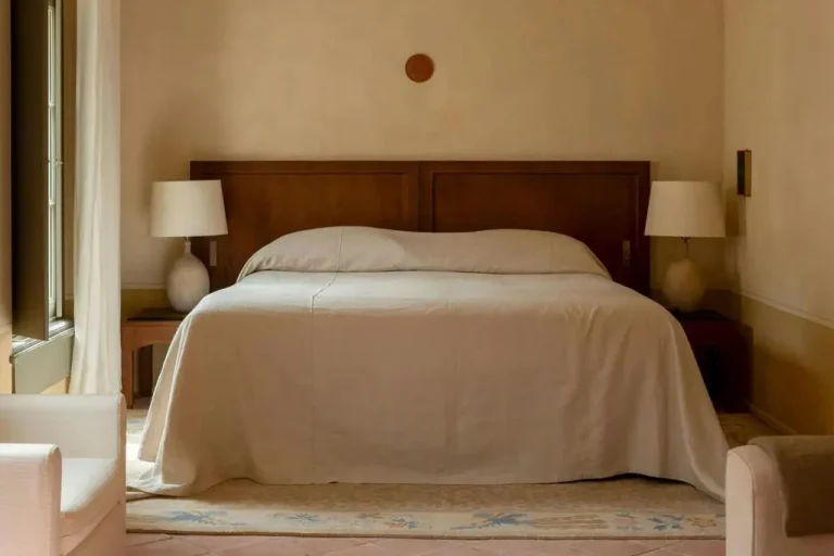 Cozy bed in a guest room at Hôtel du Couvent, a Luxury Collection Hotel in Nice