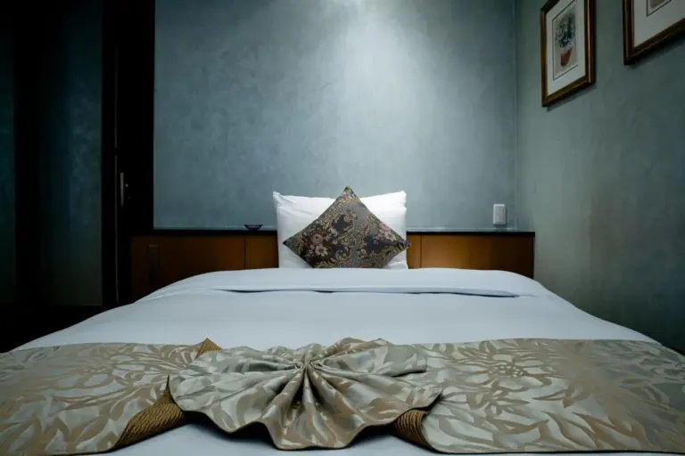 Elegant bed at Hotel Pulitzer Jiyugaoka in Tokyo