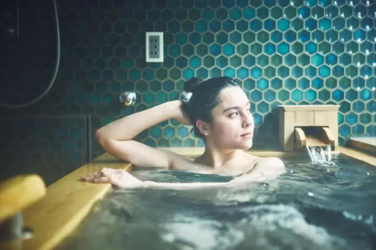 Guest enjoying a bath at Hotel Indigo Hakone Gora