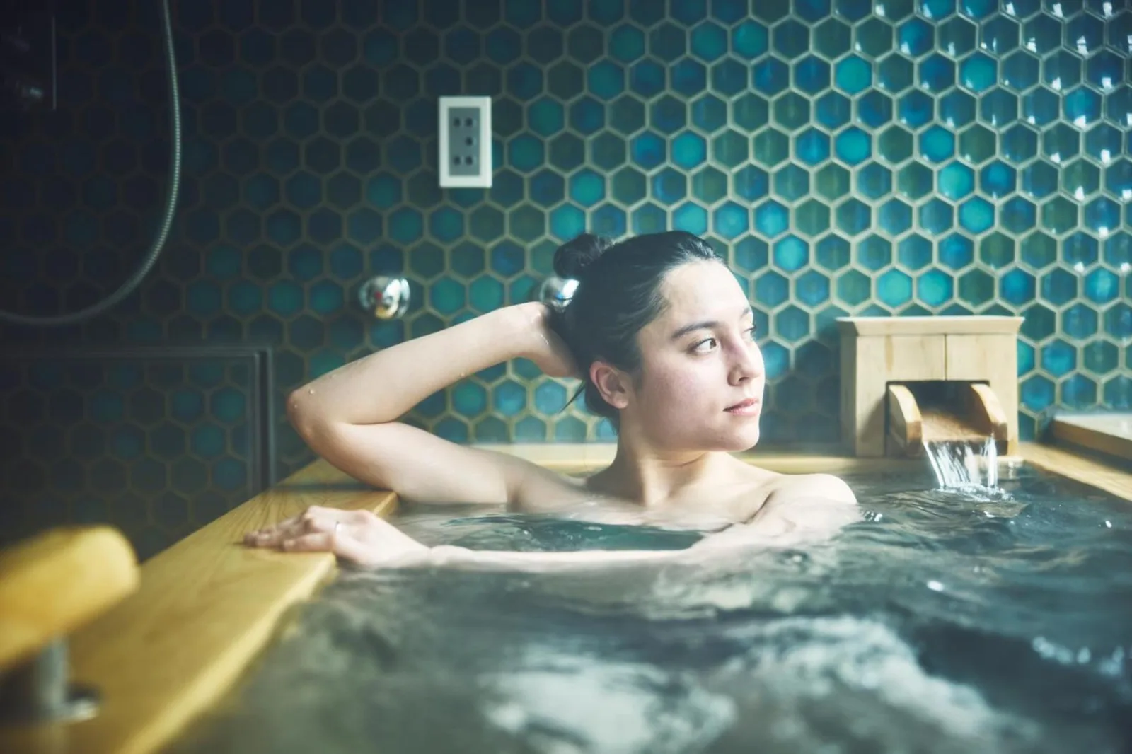Guest enjoying a bath at Hotel Indigo Hakone Gora