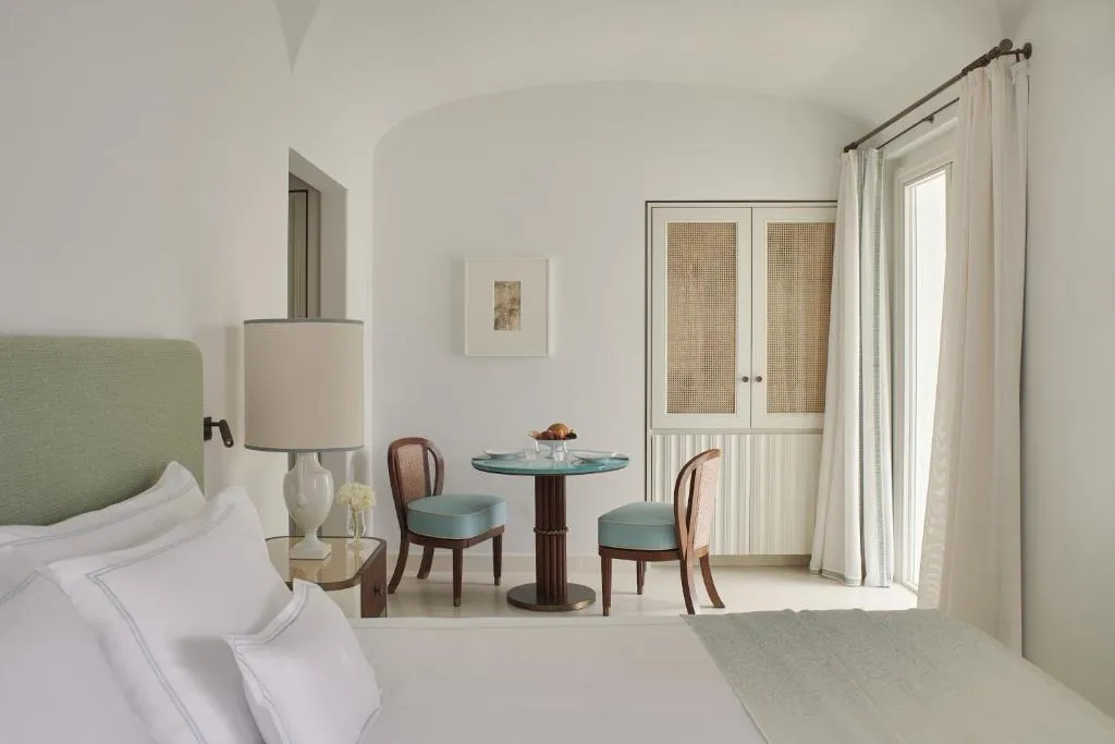 Espace de restauration charmant dans une chambre d'hôte à l'Hotel La Palma, Oetker Hotels