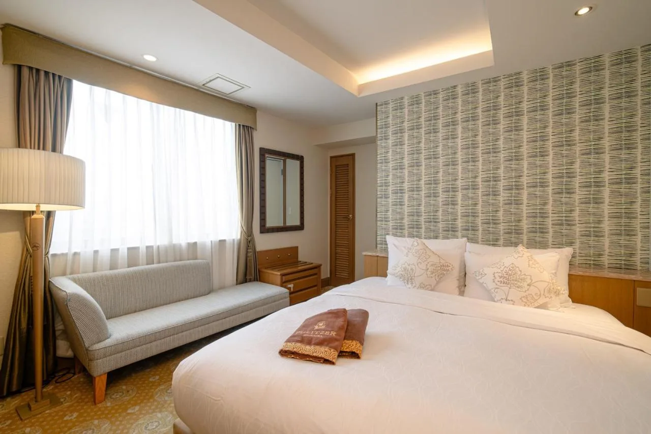 Modern bedroom at Hotel Pulitzer Jiyugaoka in Tokyo