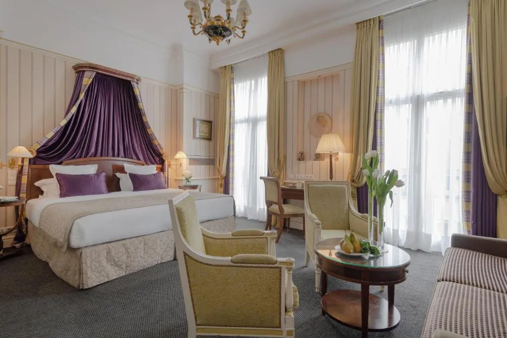 Luxurious bedroom in a suite at Hôtel Napoleon Paris