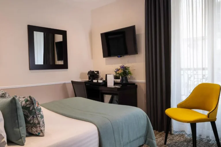 Cozy guest room at Hotel Park Lane Paris