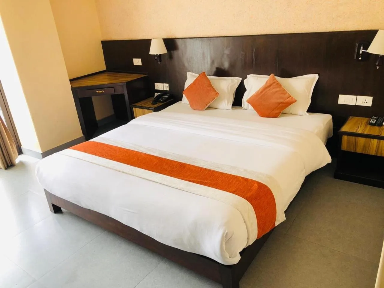 Hotel Shaara Pokhara double room with bed, desk, and wardrobe
