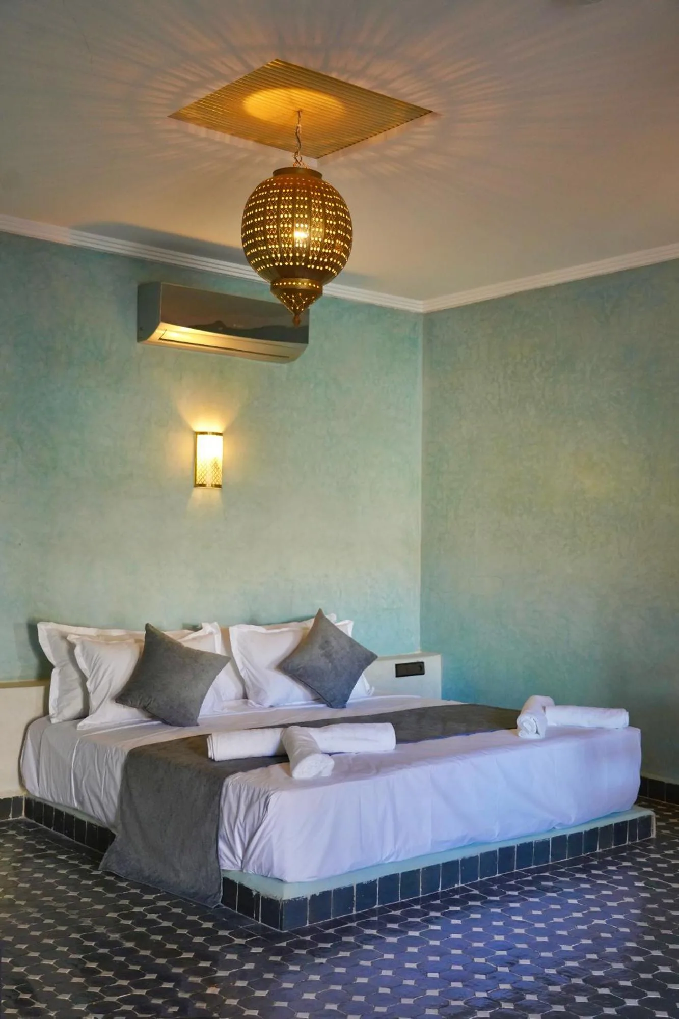 Stylish bedroom at Hotel Sunset Palace, Merzouga
