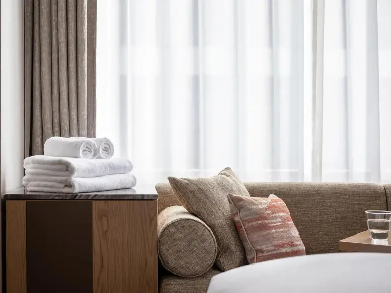 Lounge area with towels at The Celestine Tokyo Shiba