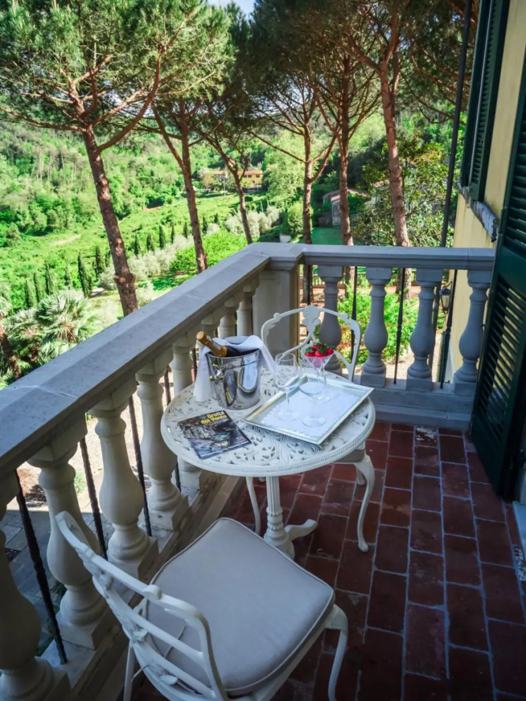 Balcony seating area at Hotel Villa Casanova in Lucca, Italy