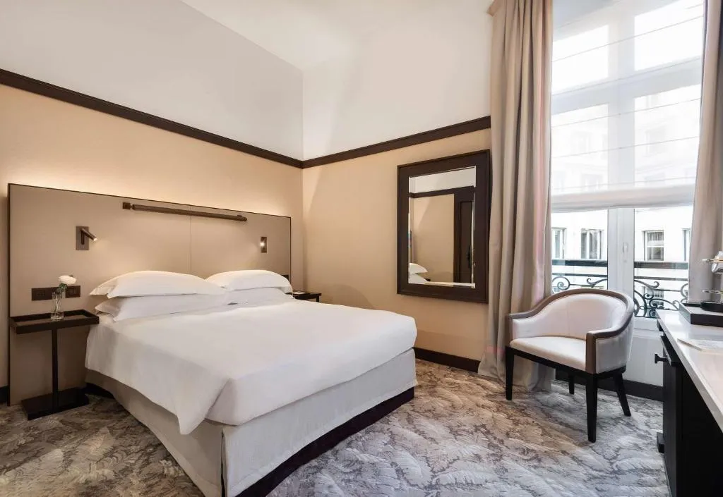 Cozy guest room at Hyatt Paris Madeleine, ideal for a romantic getaway