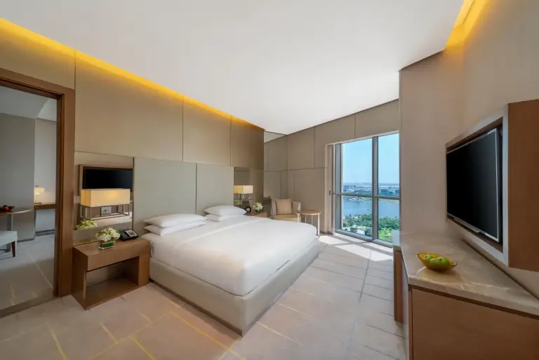 Twin bed guest room at Hyatt Regency Dubai Creek Heights in Dubai with modern furnishings and skyline view