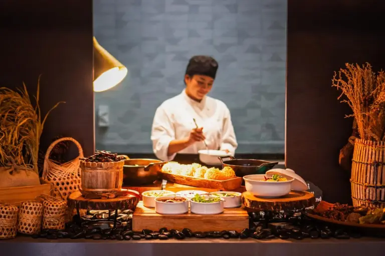 Chef preparing a meal at Hyatt Regency Koh Samui