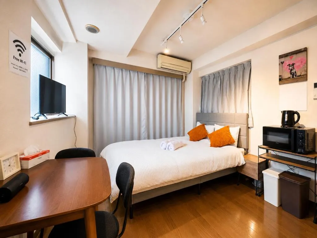 Ichigaya Stay & Wi-Fi 1 Habitación Acogedora con cama y comodidades