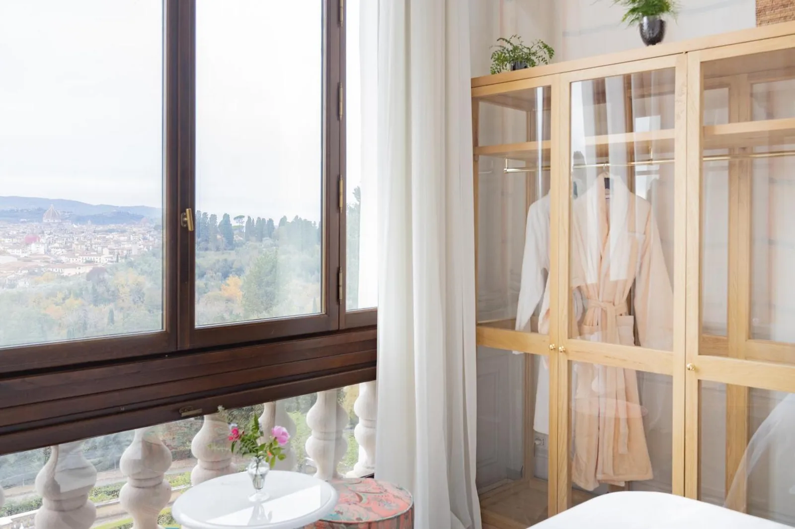 Wardrobe and view from a room at Il Salviatino Firenze