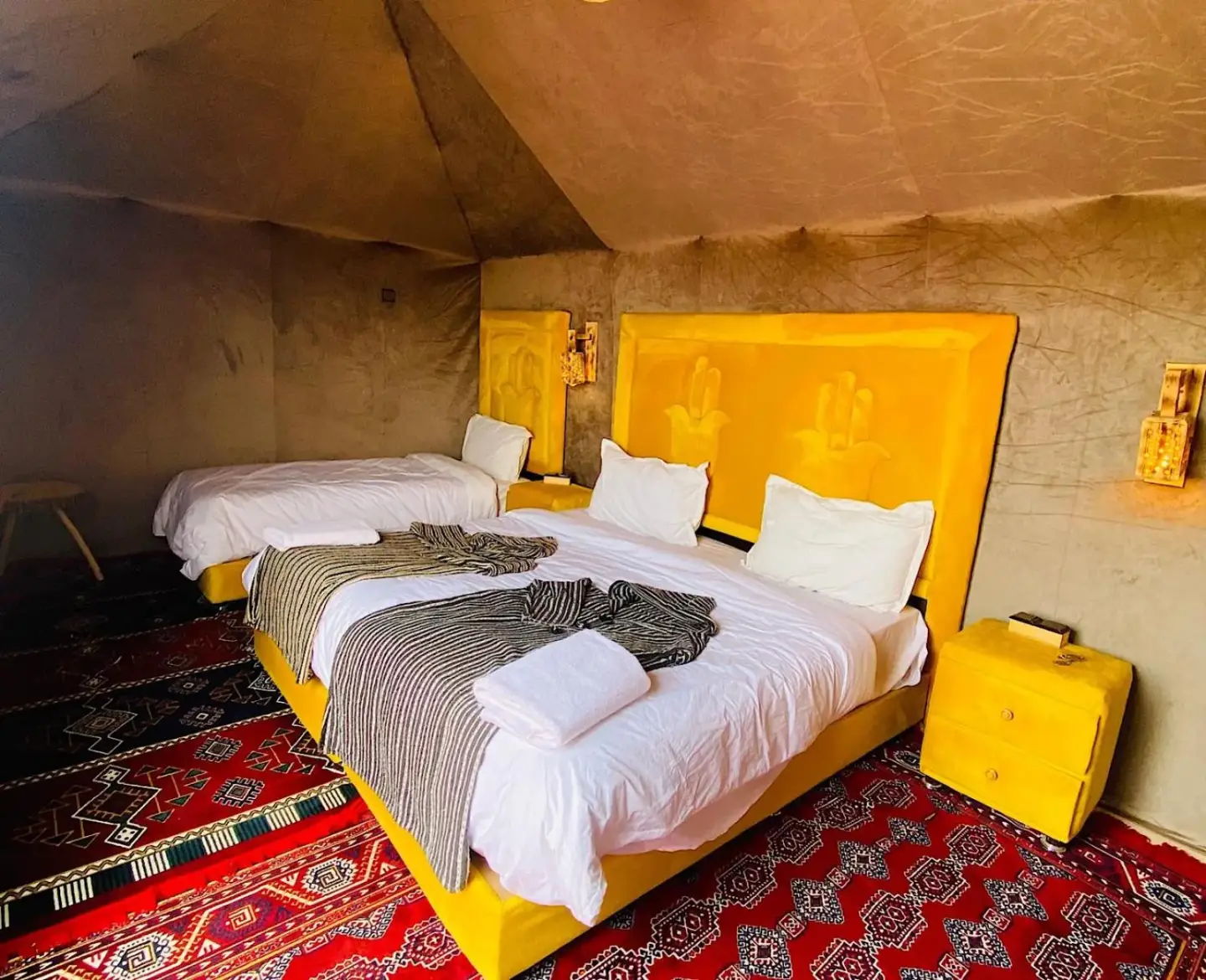 Imperial Desert Camp yellow bed tent with unique decor