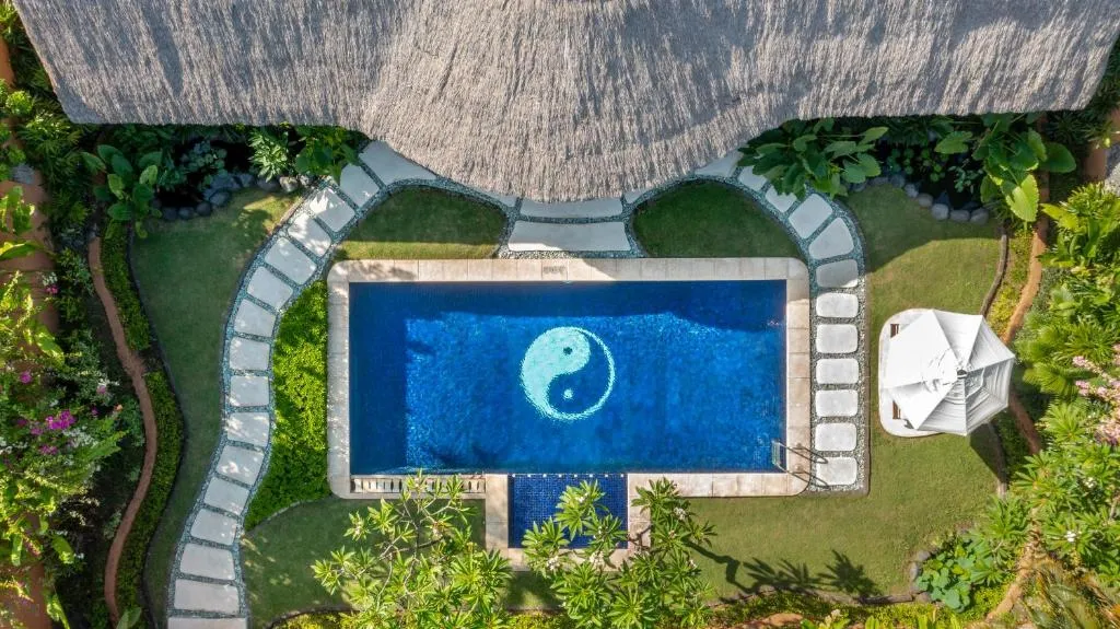 Outdoor pool area at Impiana Private Villas Seminyak