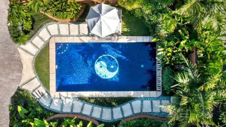 Outdoor pool at Impiana Private Villas Seminyak with a unique design