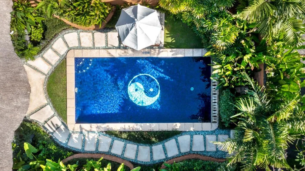 Outdoor pool at Impiana Private Villas Seminyak with a unique design