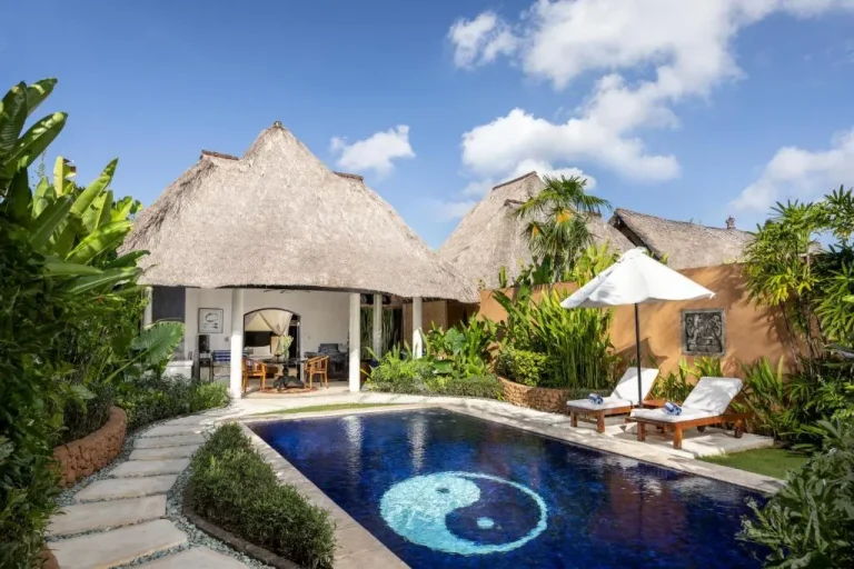 Exterior of a villa at Impiana Private Villas Seminyak with garden and pool