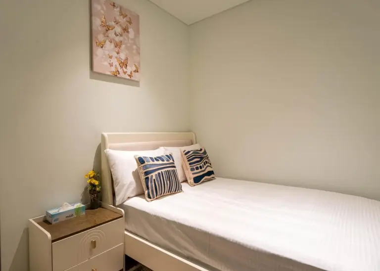 INA Homes single bedroom with tranquil design